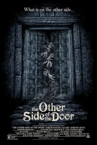 Poster to the movie "The Other Side of the Door" #131291