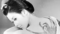 Backdrop to the movie "Irezumi" #536360