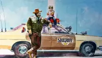 Backdrop to the movie "The Sheriff and the Satellite Kid" #415258