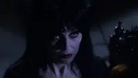 Backdrop to the movie "Elvira